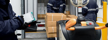 Picking Up Package Boxes In The Loading Area Of Cold Storage Warehouse Prepare To Transfer Storage In Freezing Room With Note. Storage Warehouse Service In Logistics Business Concept In Banner Size.