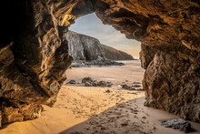 Absolutely Beautiful Landscape Images Of Holywell Bay Beach In Cornwall UK During Golden Hojur Sunset In Spring