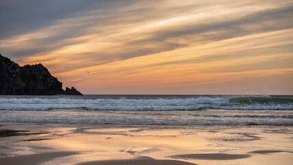 Wall Mural - absolutely stunning landscape images of holywell bay beach in cornwall uk during golden hojur sunset