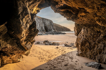 Wall Mural - absolutely beautiful landscape images of holywell bay beach in cornwall uk during golden hojur sunse