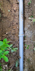 connecting two water pipes in a trench