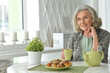 © aletia2011 - Beautiful smiling senior woman drinking tea