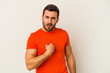 © Asier - Young caucasian man isolated on white background surprised pointing with finger, smiling broadly.