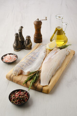 Wall Mural - Raw zander fillet on wooden cutting board