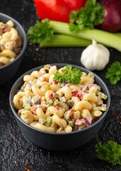 Wall Mural - Macaroni Salad with red bell pepper, onion, celery, gherkins and mayonnaise dressing