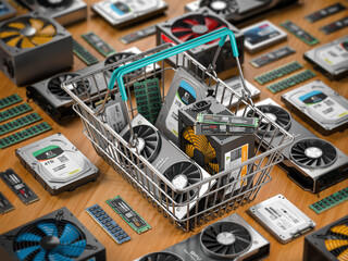 computer hardware in shopping basket. buying pc computer parts online concept.