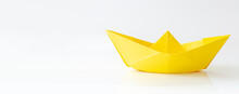 Yellow Paper Boat Isolated On White Background With Copy Space, Banner