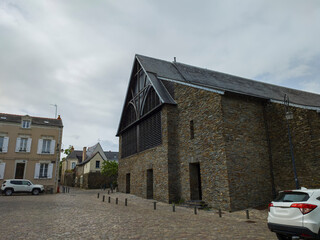 Wall Mural - stone houses and cars parked in the courtyards