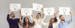 canvas print picture - Sharing experiences and ideas. Interracial colleagues hold a white layout with light bulbs symbolizing a new idea. Group of people expressing their opinion holding posters on a gray background.