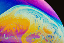 Fluid Art Made Of Colorful Soap Bubble Film. Trendy Inkscape Blurred Background. Alien Space Planets Art. Selective Focus.