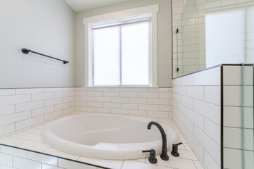 Sticker - Minimalistic bathroom interior design with white brick tiles and a window