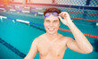 © Parilov - Portrait swimmer happy young man, background swimming pool blue water