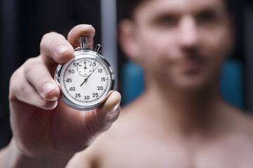 Mechanical stopwatch in a hand