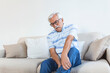 © Graphicroyalty - Pain in the leg of an elderly man. Senior man holding painful muscle, sprain or cramp ache