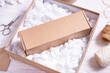© mdbildes - Lot of loose white Filler Shipping Packing Peanuts in cardboard box