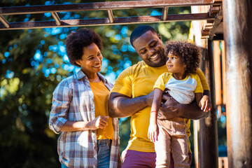 African American family having fun outdoors.