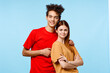 © SHOTPRIME STUDIO - young couple cropped view studio blue background communication