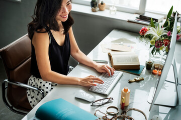 Wall Mural - A woman working happily
