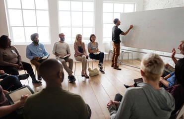 Wall Mural - Man presenting at a seminar