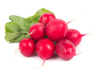 Poster - Radis bunch isolated on white background. Fresh radish root bundle, pile of red radishes with green leaves top view