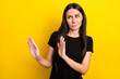 Photo portrait of girl looking copyspace disgusted rejecting ignoring isolated vibrant yellow color background