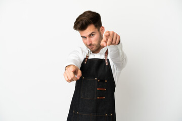 Restaurant caucasian waiter isolated on white background points finger at you while smiling