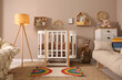 © New Africa - Baby room interior with stylish furniture and comfortable crib
