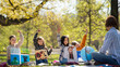 © Halfpoint - Small children with teacher outdoors in city park, learning group education and art concept.