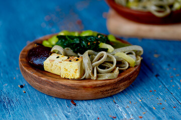 Canvas Print - tofu, spelt tagliatelle, edamame beans and kale