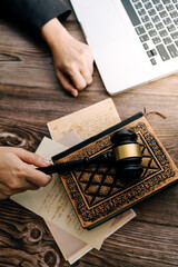 Business and lawyers discussing contract papers with brass scale on desk in office. Law, legal services, advice, justice and law concept picture with film grain effect