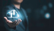 © Dilok - Businessman holding and giving virtual cloud computing with copy space to transfer data information and upload download application. Technology transformation concept.
