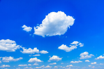 White fluffy clouds in the blue sky