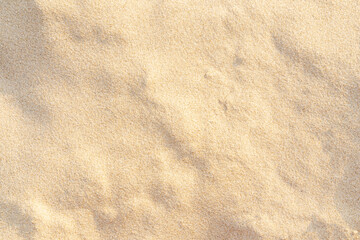 Wall Mural - Sand pattern texture for background. Brown desert pattern from tropical beach.