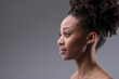Profile portrait of a serious beautiful young black woman