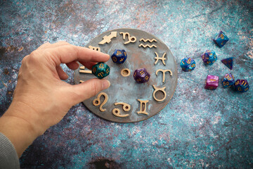 Wall Mural - zodiac horoscope symbol with fortune-teller hands and healing crystals on rustic background