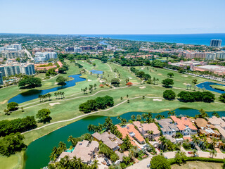 Wall Mural - aerial drone of Golf course in Boca Raton, Florida with city