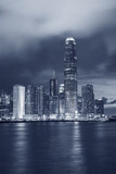 Fototapeta Miasto - Skyline and harbor of Hong Kong city at dusk