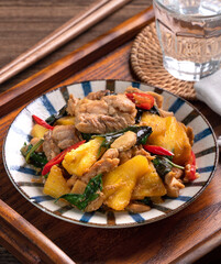 Wall Mural - Stir-fried Taiwanese Three Cup Chicken with pineapple.