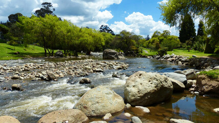 View at confluence of two mountain rivers Tomebamba and Yanuncay at the valley of Cuenca city in the  park Paraiso, Ecuador