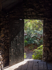 Wall Mural - View of the lush coastal vegetation from Halfway Hut through the doorway - Wilsons Promontory, Victoria, Australia