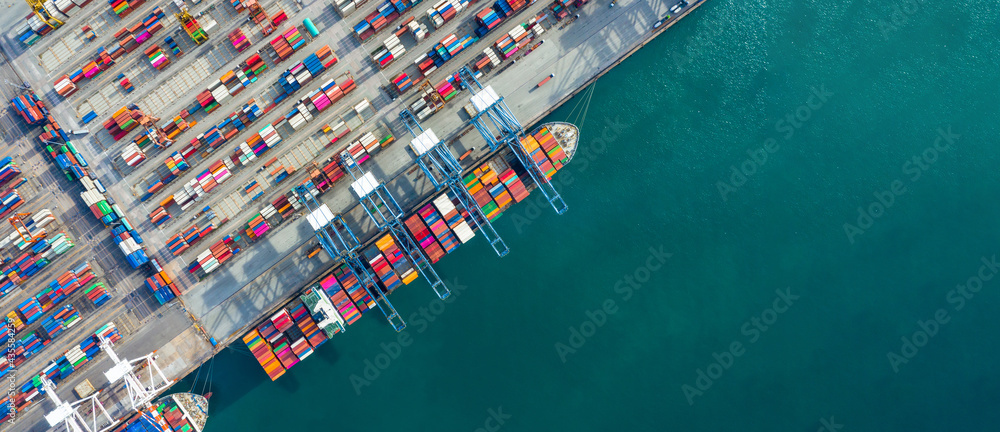 Aerial view container ship in port at container terminal port, Ship of container ship stand in terminal port on loading, unloading container, Commercial cargo ship in sea port. - obrazy, fototapety, plakaty 