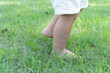 © Awesomelia - baby bare foot in grass summer