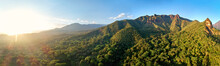 Aerial, Large Panoramic View On Green Slopes Of Bale Mountains Covered In Montane Forest. Harenna Forest, Ethiopia, Africa. Setting Sun Over Bale Mountains National Park. African Nature