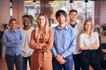 Portrait Of Multi-Cultural Business Team In Modern Multi-Cultural Office