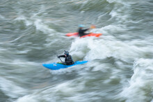 A Kayaker Surfs Big Standing Waves Of The Potomac River Near Great Falls In His Whitewater Boat, Virginia