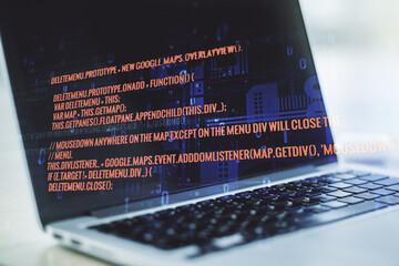 double exposure of abstract programming language on laptop background, research and development conc