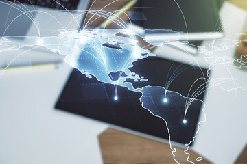 Wall Mural - double exposure of abstract digital world map with connections and modern digital tablet on backgrou