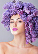 © Svetlana Fedoseeva - Beauty fashion model Girl with Lilac Flowers Hair Style. Nature Hairstyle. Summer. Professional makeup.
