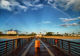 Fototapeta  - Rainbow over the Lake Worth Florida fishing pier