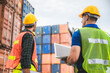 © chokniti - logistic worker teamwork and partner of foreman, engineer, and businessman working in an international shipping area, concept of business industrial and working in container yard to import and export